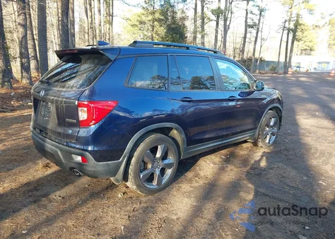 2021 Honda Passport 2Wd Touring from USA, damaged, VIN 5FNYF7H90MB006515